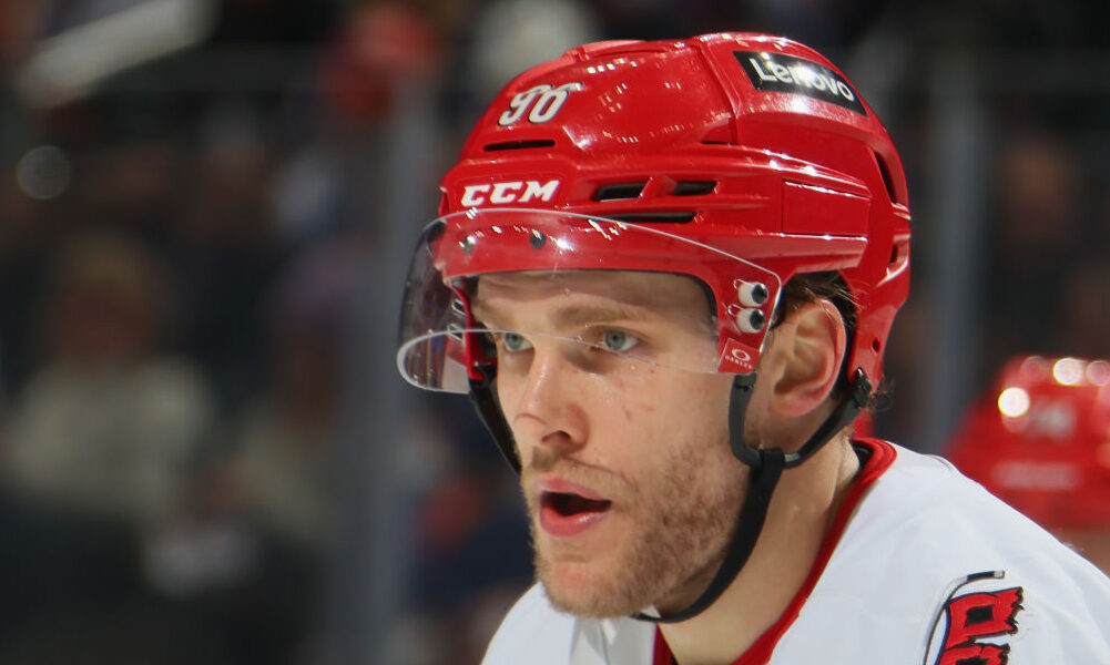 Mikko Rantanen #96 of the Carolina Hurricanes skates against the New York Islanders at UBS Arena...